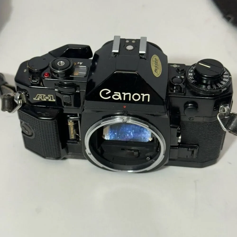 Vintage Canon A-1 Black 35 mm SLR with Strap/ Body Only